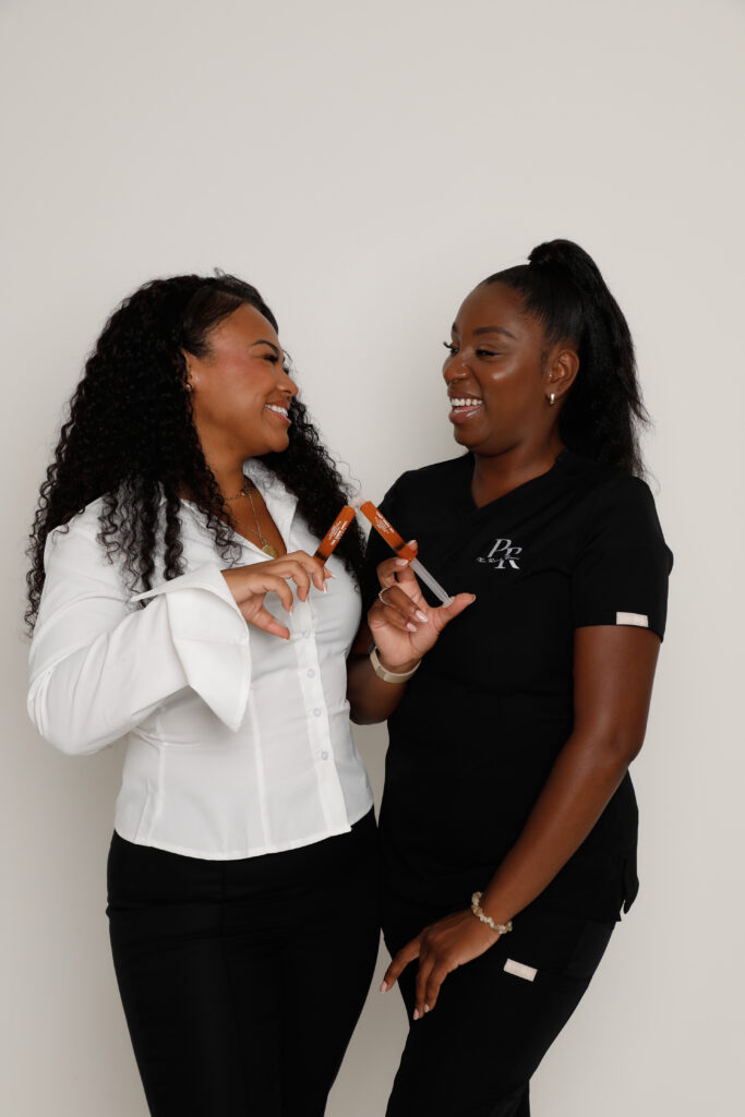 Naomi and her client posing